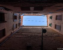 Venice Look Up I A view of the narrow streets in venice up to the sky.